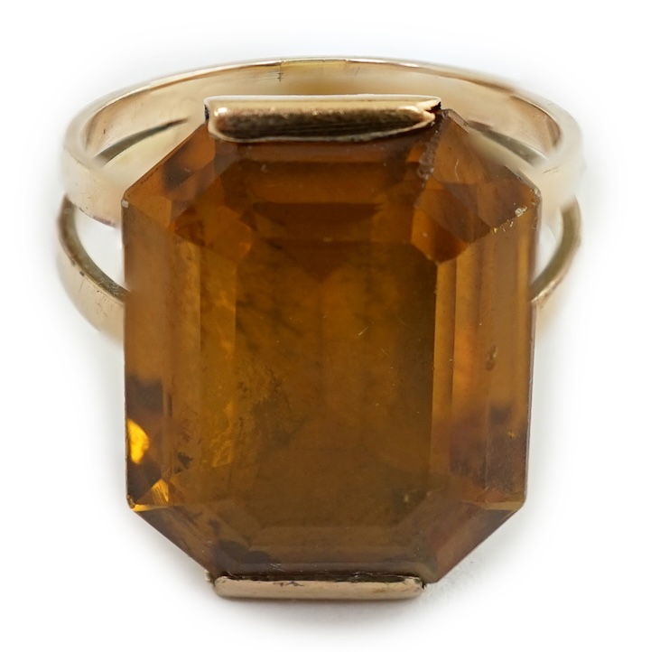 A mid to late 20th century gold and single stone octagonal cut synthetic? sapphire set dress ring